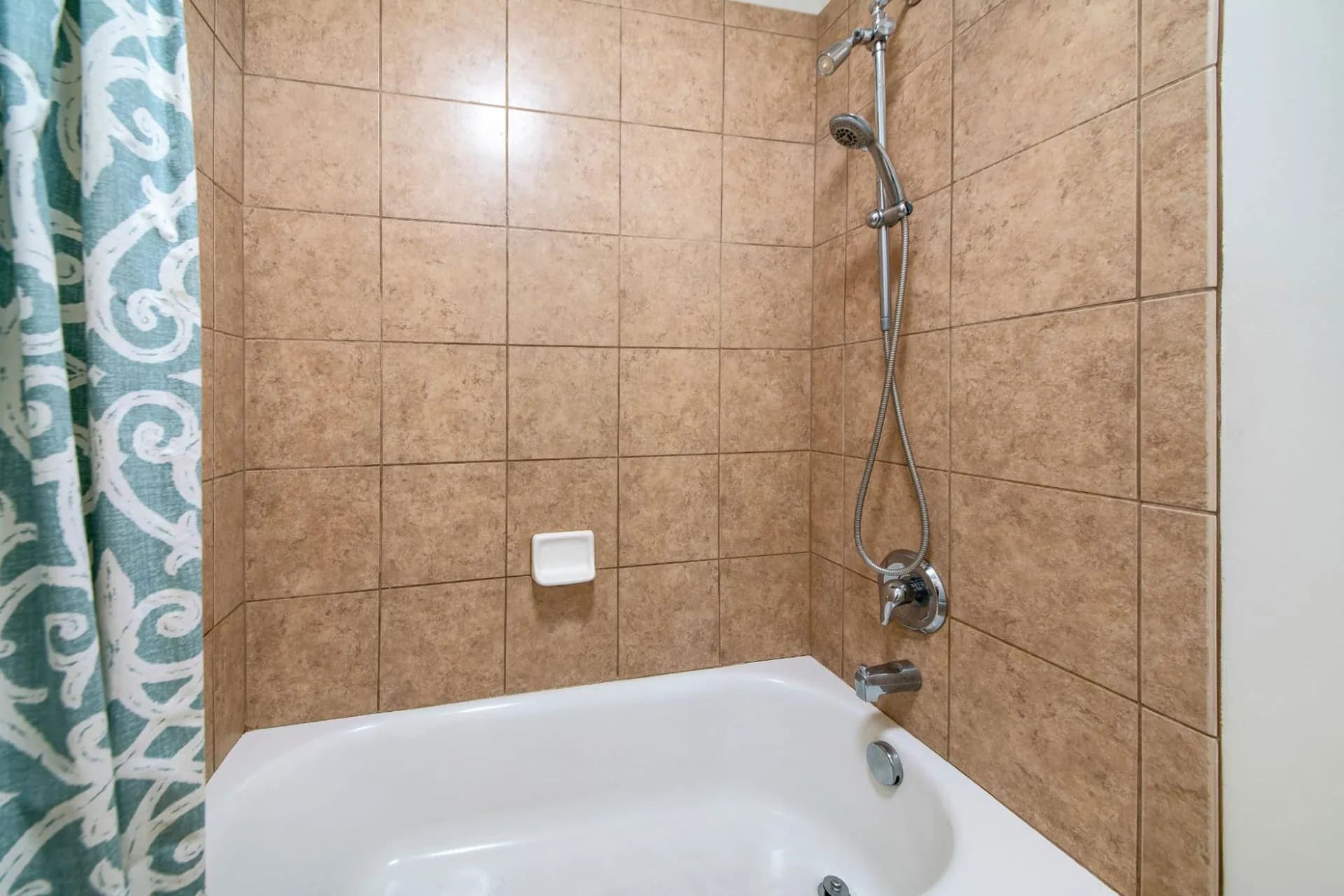An alcove bathtub