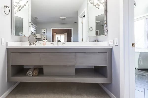 Wall to wall bathroom vanity installed by plumber in hamilton