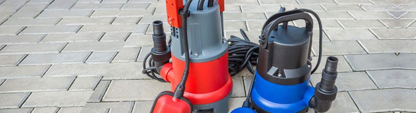 Two household sump pumps ready to be installed